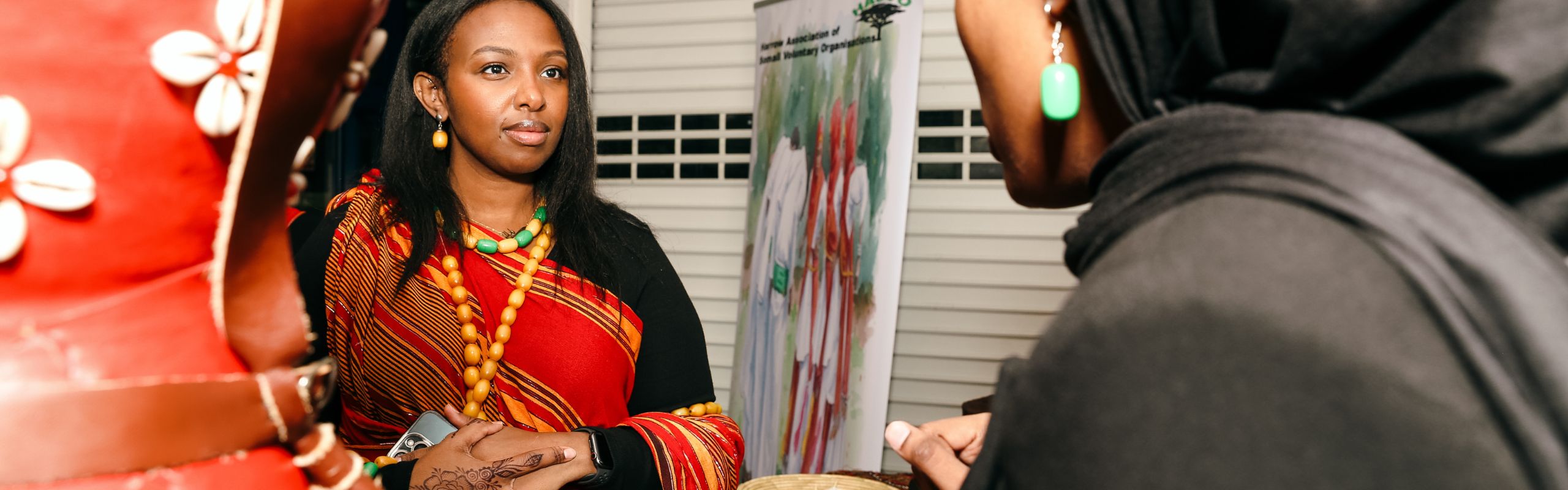 Women chatting at a HASVO event