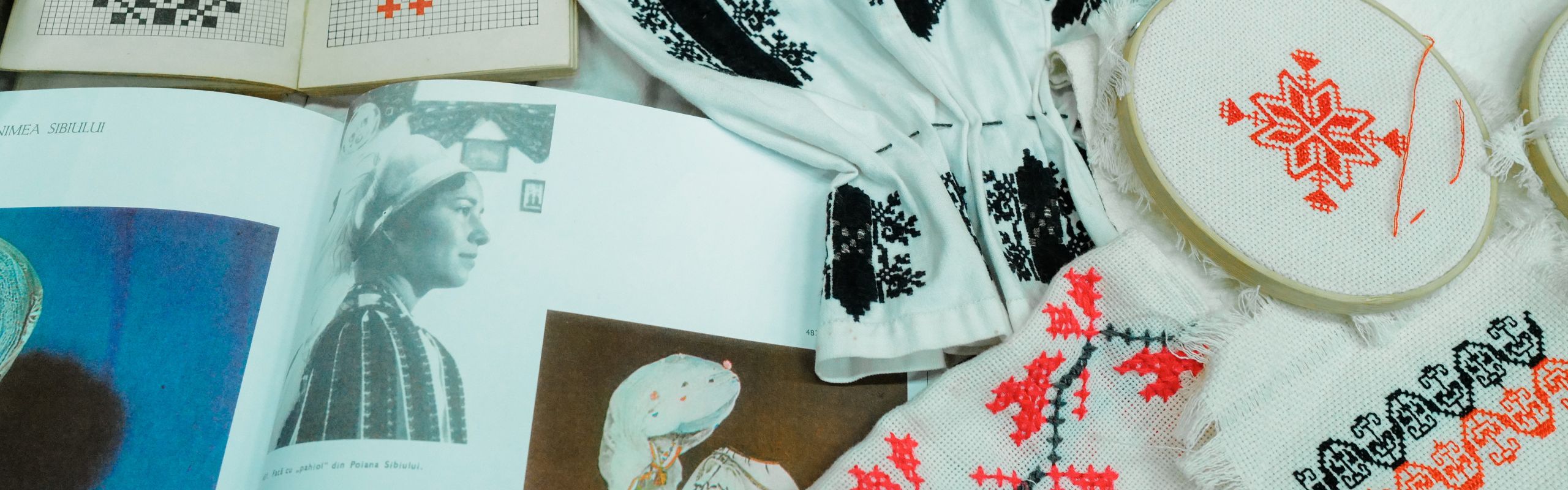 A display of embroidery collected by RCCT